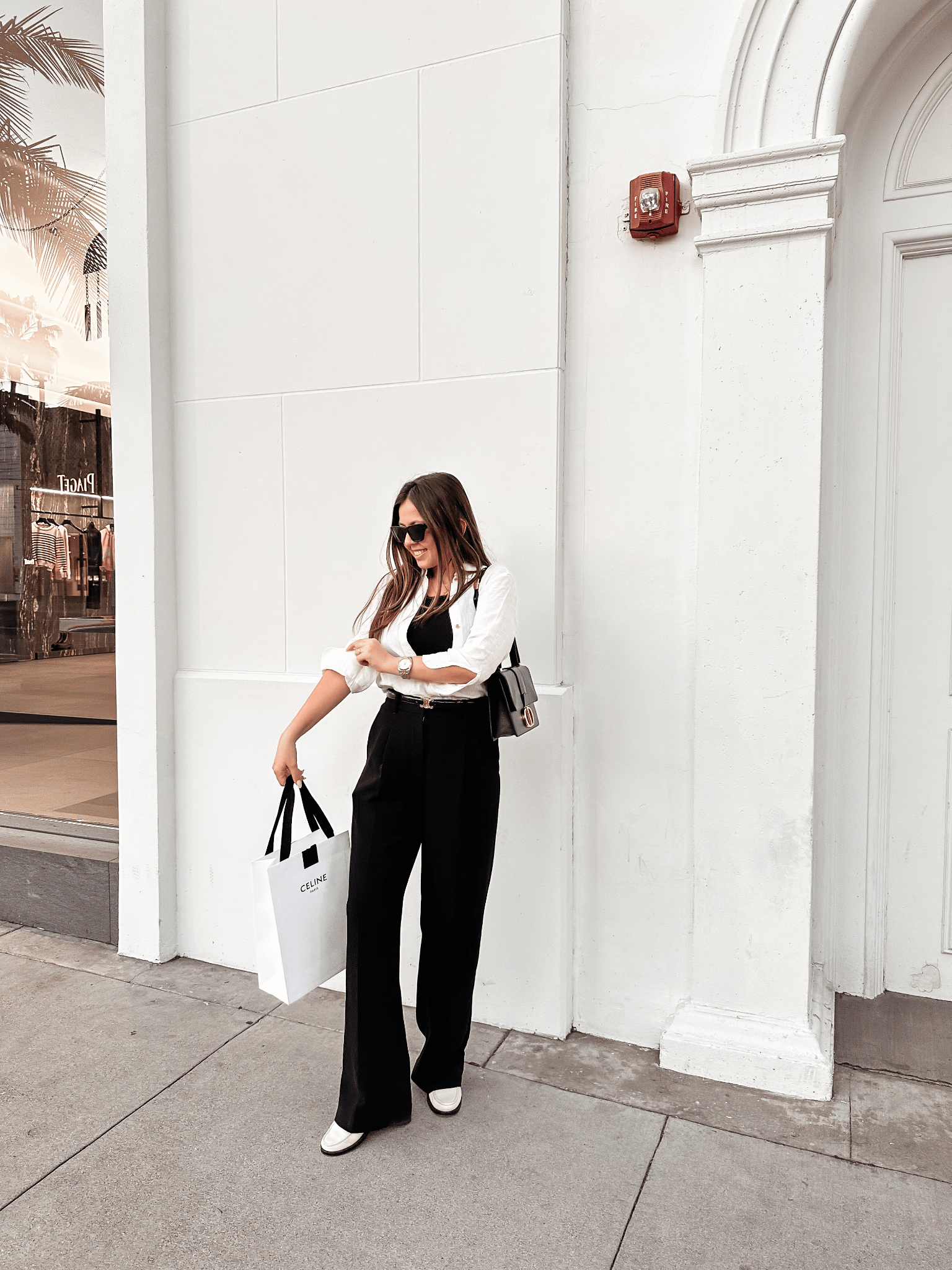 photo of a woman holding a shopping bag